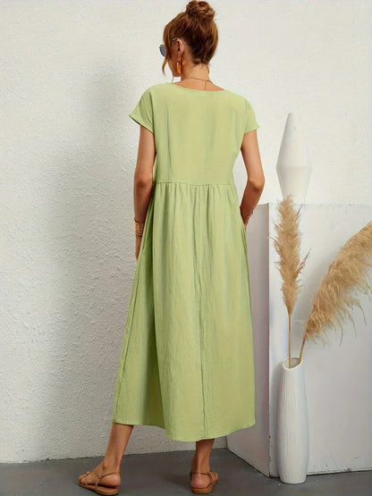 Gabrielle™ — Elegancka, midi sukienka o swobodnym kroju